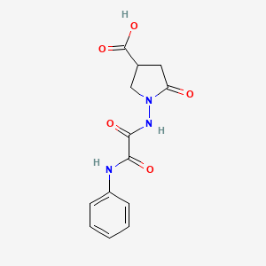 B1449379 1-{[Anilino(oxo)acetyl]amino}-5-oxopyrrolidine-3-carboxylic acid CAS No. 2173116-24-8