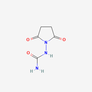 molecular formula C5H7N3O3 B14494472 N-(2,5-Dioxopyrrolidin-1-yl)urea CAS No. 63770-74-1