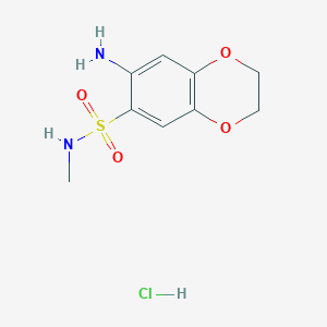 molecular formula C9H13ClN2O4S B1450289 7-Amino-N-methyl-2,3-dihydrobenzo[b][1,4]dioxine-6-sulfonamide hydrochloride CAS No. 1417350-06-1