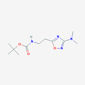 molecular formula C11H20N4O3 B1450319 tert-butyl N-{2-[3-(dimethylamino)-1,2,4-oxadiazol-5-yl]ethyl}carbamate CAS No. 1803599-61-2