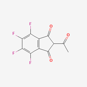 molecular formula C11H4F4O3 B14503507 2-Acetyl-4,5,6,7-tetrafluoro-1H-indene-1,3(2H)-dione CAS No. 64586-63-6