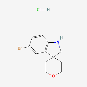molecular formula C12H15BrClNO B1450659 5-Bromo-1,2-dihydrospiro[indole-3,4'-oxane] hydrochloride CAS No. 1609266-05-8