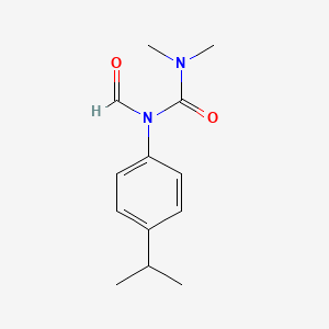 molecular formula C13H18N2O2 B14510654 N-(Dimethylcarbamoyl)-N-[4-(propan-2-yl)phenyl]formamide CAS No. 62719-40-8