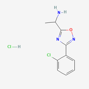molecular formula C10H11Cl2N3O B1451239 1-[3-(2-Chloro-phenyl)-[1,2,4]oxadiazol-5-YL]-ethylamine hydrochloride CAS No. 1185304-86-2