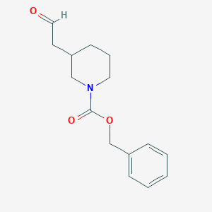 molecular formula C15H19NO3 B1451397 Benzyl 3-(2-oxoethyl)piperidine-1-carboxylate CAS No. 372159-77-8