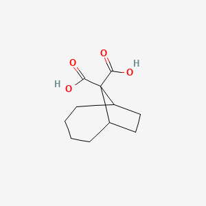 molecular formula C11H16O4 B14514071 Bicyclo[4.2.1]nonane-9,9-dicarboxylic acid CAS No. 62858-91-7
