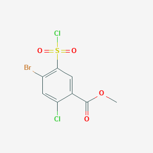 molecular formula C8H5BrCl2O4S B1452243 Methyl 4-bromo-2-chloro-5-(chlorosulfonyl)benzoate CAS No. 1157673-21-6
