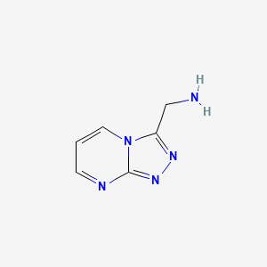 molecular formula C6H7N5 B1452624 [1,2,4]三唑并[4,3-a]嘧啶-3-基甲胺 CAS No. 1018588-47-0