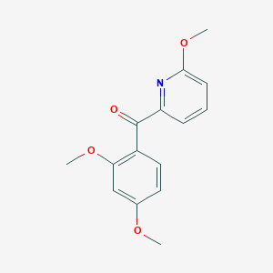 molecular formula C15H15NO4 B1453125 2-(2,4-Dimethoxybenzoyl)-6-methoxypyridine CAS No. 1187168-15-5