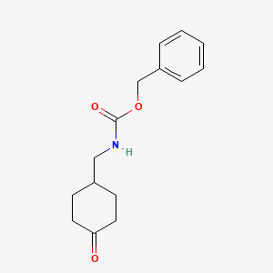 molecular formula C15H19NO3 B1453314 4-N-Cbz-Aminomethyl-cyclohexone CAS No. 869895-17-0