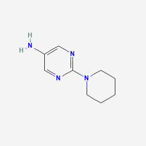 molecular formula C9H14N4 B1453681 2-(Piperidin-1-yl)pyrimidin-5-amine CAS No. 1086378-61-1