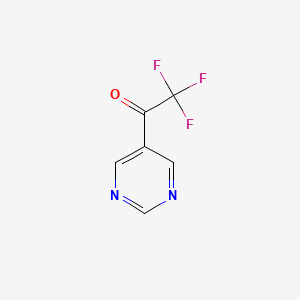 molecular formula C6H3F3N2O B1453926 2,2,2-Trifluoro-1-(pyrimidin-5-yl)ethanone CAS No. 1342264-46-3