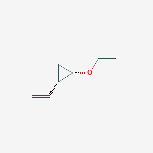 molecular formula C7H12O B14540380 (1S,2S)-1-Ethenyl-2-ethoxycyclopropane CAS No. 62153-61-1