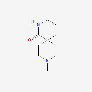 molecular formula C10H18N2O B1454227 9-甲基-2,9-二氮杂螺[5.5]十一烷-1-酮 CAS No. 1228552-71-3