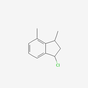 molecular formula C11H13Cl B1454627 1-chloro-3,4-dimethyl-2,3-dihydro-1H-indene CAS No. 1410427-26-7