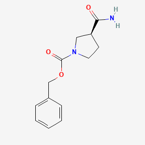 molecular formula C13H16N2O3 B1454871 (S)-1-Cbz-3-pyrrolidinecarboxamide CAS No. 573704-57-1