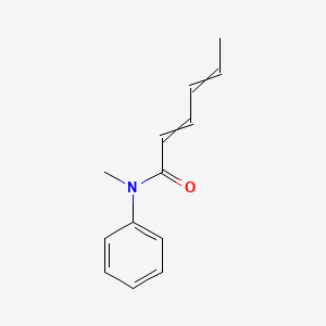 molecular formula C13H15NO B14549516 N-methyl-N-phenylhexa-2,4-dienamide CAS No. 61859-43-6