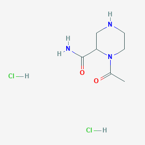 molecular formula C7H15Cl2N3O2 B1455115 1-Acetylpiperazine-2-carboxamide dihydrochloride CAS No. 1361111-46-7