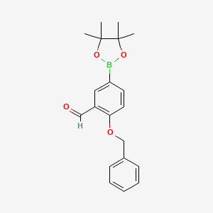 molecular formula C20H23BO4 B1455195 2-Benzyloxy-5-(4,4,5,5-tetramethyl-[1,3,2]dioxaborolan-2-yl)-benzaldehyde CAS No. 2096339-03-4