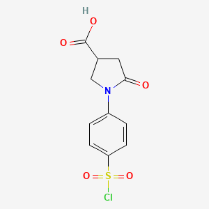 molecular formula C11H10ClNO5S B1455220 1-[4-(Chlorosulfonyl)phenyl]-5-oxopyrrolidine-3-carboxylic acid CAS No. 874496-79-4