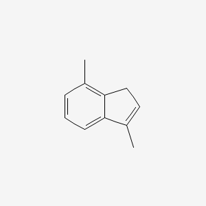 molecular formula C11H12 B14553843 3,7-Dimethyl-1H-indene CAS No. 61957-53-7