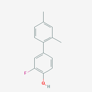 molecular formula C14H13FO B1455690 4-(2,4-Dimethylphenyl)-2-fluorophenol CAS No. 1261978-86-2