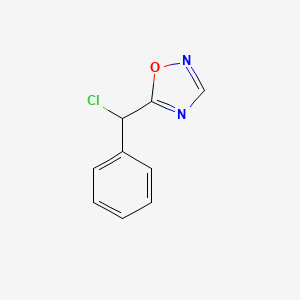 molecular formula C9H7ClN2O B1455709 5-[Chloro(phenyl)methyl]-1,2,4-oxadiazole CAS No. 1249972-62-0