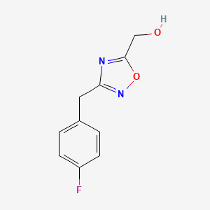 molecular formula C10H9FN2O2 B1456209 {3-[(4-Fluorophenyl)methyl]-1,2,4-oxadiazol-5-yl}methanol CAS No. 1341975-18-5