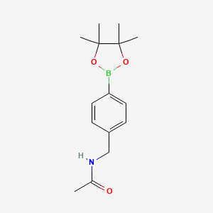 molecular formula C15H22BNO3 B1456454 N-{[4-(四甲基-1,3,2-二恶杂硼环-2-基)苯基]甲基}乙酰胺 CAS No. 1235450-93-7