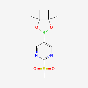 molecular formula C11H17BN2O4S B1456682 2-(Methylsulfonyl)-5-(4,4,5,5-tetramethyl-1,3,2-dioxaborolan-2-yl)pyrimidine CAS No. 1417628-73-9