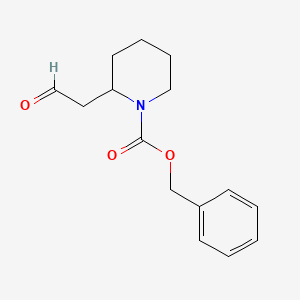molecular formula C15H19NO3 B1456812 Benzyl 2-(2-oxoethyl)piperidine-1-carboxylate CAS No. 885274-50-0