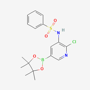 molecular formula C17H20BClN2O4S B1456912 N-[2-chloro-5-(4,4,5,5-tetramethyl-1,3,2-dioxaborolan-2-yl)-3-pyridinyl]benzenesulfonamide CAS No. 1083326-55-9