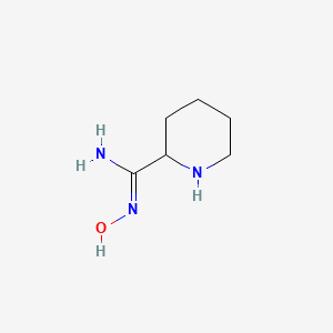 molecular formula C6H13N3O B1457372 N'-hydroxypiperidine-2-carboximidamide CAS No. 1461726-91-9