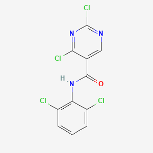 molecular formula C11H5Cl4N3O B1457766 2,4-Dichloro-N-(2,6-dichlorophenyl)pyrimidine-5-carboxamide CAS No. 835633-83-5