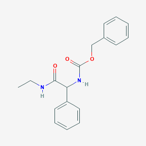 molecular formula C18H20N2O3 B1457936 Z-DL-Phg-nhet CAS No. 1393441-62-7