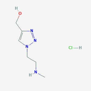 molecular formula C6H13ClN4O B1458032 (1-(2-(methylamino)ethyl)-1H-1,2,3-triazol-4-yl)methanol hydrochloride CAS No. 1820666-15-6