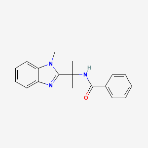 molecular formula C18H19N3O B1458310 N-[2-(1-methyl-1H-1,3-benzodiazol-2-yl)propan-2-yl]benzamide CAS No. 1461714-37-3