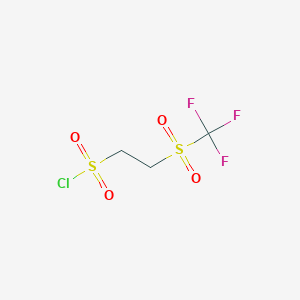 B1458451 2-Trifluoromethanesulfonylethane-1-sulfonyl chloride CAS No. 1803584-10-2