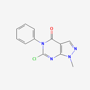 molecular formula C12H9ClN4O B1458525 6-chloro-1-methyl-5-phenyl-1H,4H,5H-pyrazolo[3,4-d]pyrimidin-4-one CAS No. 1803589-53-8