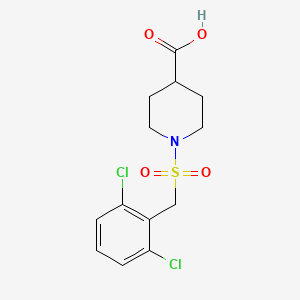 molecular formula C13H15Cl2NO4S B1458561 1-[(2,6-Dichlorobenzyl)sulfonyl]piperidine-4-carboxylic acid CAS No. 1858241-39-0