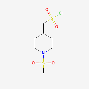 molecular formula C7H14ClNO4S2 B1458895 (1-Methanesulfonylpiperidin-4-yl)methanesulfonyl chloride CAS No. 1803562-78-8
