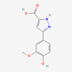 molecular formula C11H10N2O4 B1459968 5-(4-hydroxy-3-methoxyphenyl)-1H-pyrazole-3-carboxylic acid CAS No. 1229025-28-8