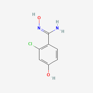 molecular formula C7H7ClN2O2 B1460019 2-chloro-N',4-dihydroxybenzene-1-carboximidamide CAS No. 1062669-34-4