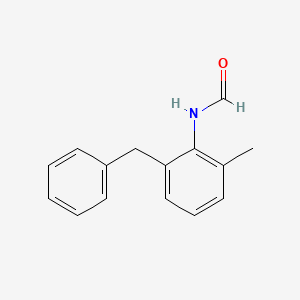 molecular formula C15H15NO B14600804 Formamide, N-[2-methyl-6-(phenylmethyl)phenyl]- CAS No. 60287-94-7