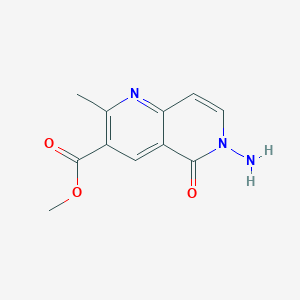 molecular formula C11H11N3O3 B1460764 Methyl 6-amino-2-methyl-5-oxo-5,6-dihydro-1,6-naphthyridine-3-carboxylate CAS No. 1030419-97-6