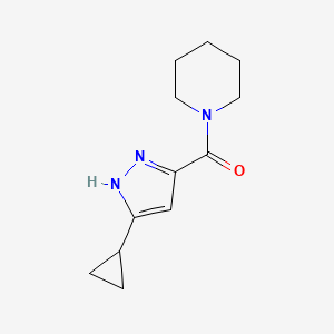 molecular formula C12H17N3O B1462163 1-(3-cyclopropyl-1H-pyrazole-5-carbonyl)piperidine CAS No. 1186634-98-9