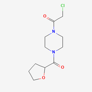 molecular formula C11H17ClN2O3 B1462200 2-Chloro-1-(4-(tetrahydrofuran-2-carbonyl)piperazin-1-yl)ethan-1-one CAS No. 1018304-05-6