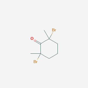 molecular formula C8H12Br2O B14622449 2,6-Dibromo-2,6-dimethylcyclohexanone CAS No. 56829-67-5