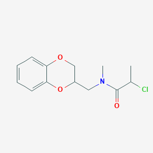 molecular formula C13H16ClNO3 B1462565 2-chloro-N-(2,3-dihydro-1,4-benzodioxin-2-ylmethyl)-N-methylpropanamide CAS No. 1098361-12-6