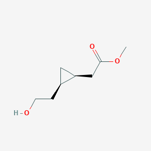 molecular formula C8H14O3 B14625729 Methyl [(1S,2R)-2-(2-hydroxyethyl)cyclopropyl]acetate CAS No. 59014-46-9